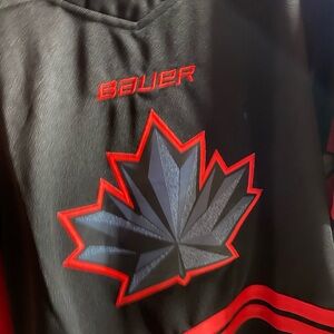 Wilson Bauer Black and Red Maple Leaf Hockey Jersey